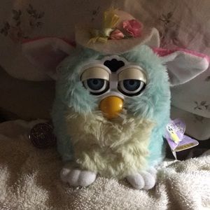 Furby she’s adorable works well in excellent condition has all tags no box